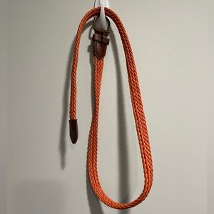 Orange woven belt with brown trim Approx 38" long